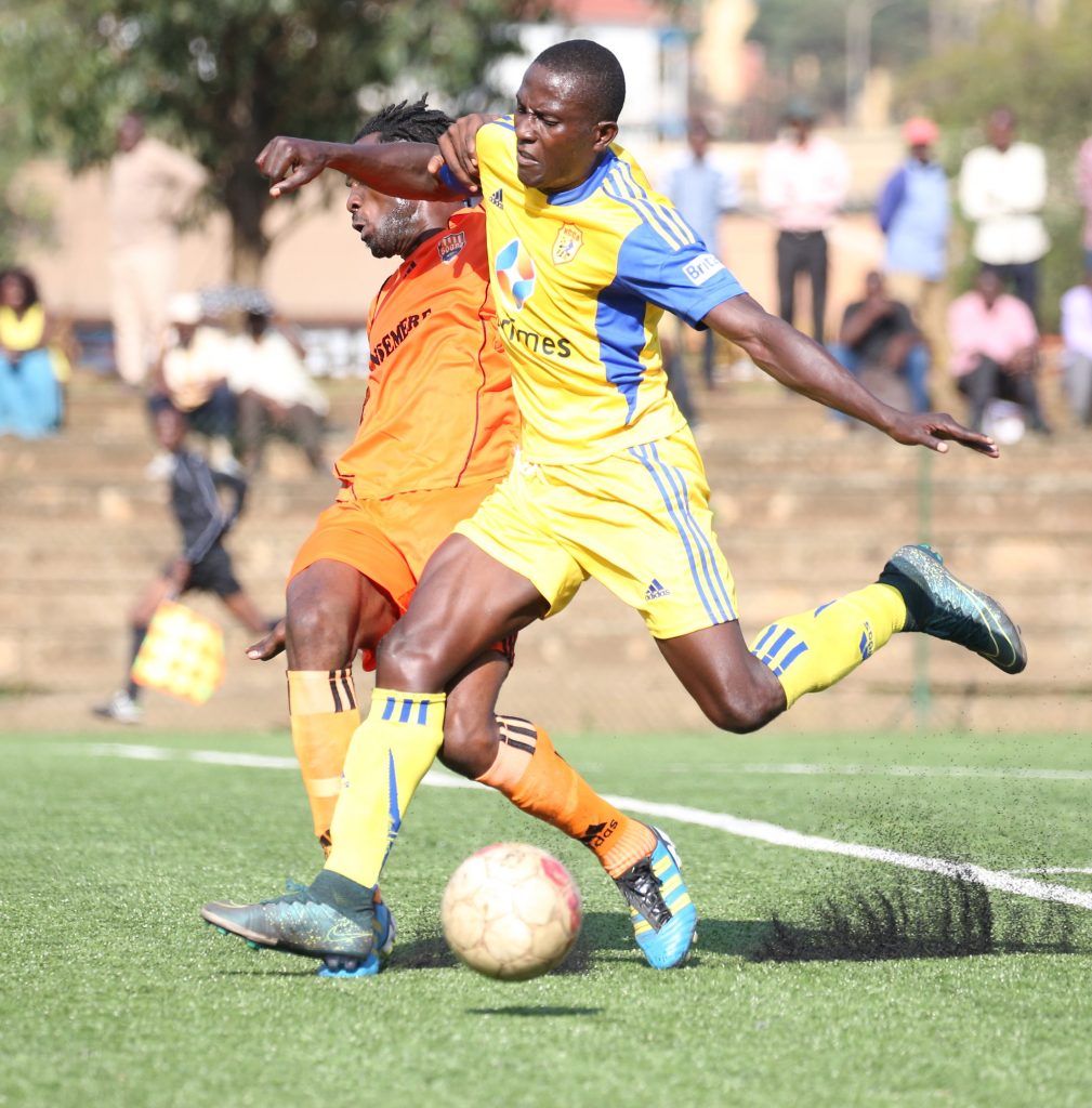 Geoffrey Serunkuuma (R) is the leading scorer for KCCA and the country in the 2016/2017 AUPL on ine goals in 13 league appearances 